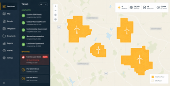 Screenshot of a land management software dashboard showing a map of a wind farm project and an urgent alert to exercise a lease option.
